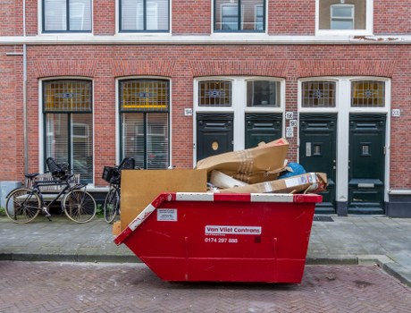 People disposing of old furniture in Hendon