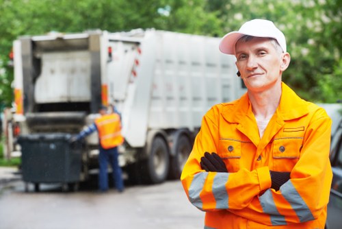 Bulk waste collection team handling large furniture items