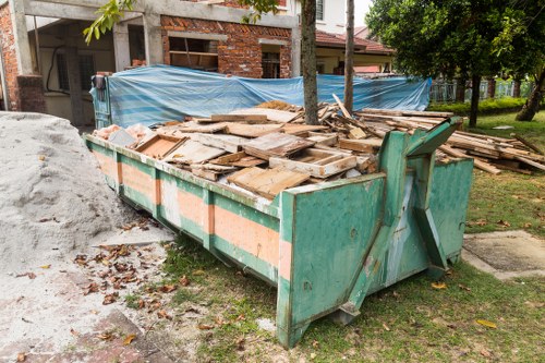 A collection of old furniture ready for disposal