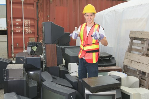 People disposing of furniture in Sudbury