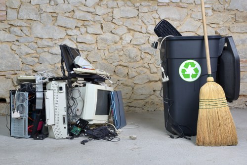 People removing old furniture for disposal