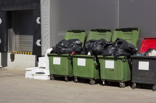 Professional waste removal service handling furniture