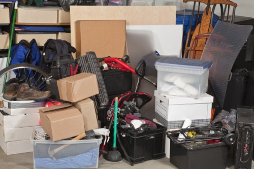 Professionals handling furniture recycling process